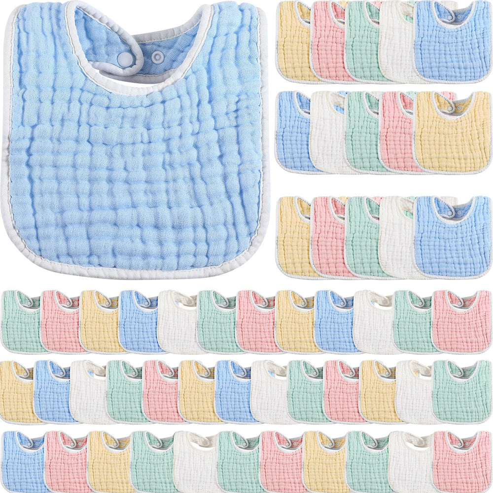 Tatuo 50-pcs muslin bibs close-up shows 6-layer absorbent design.