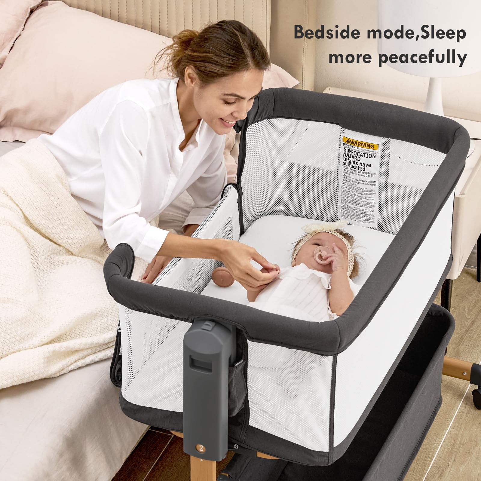 Taylengrow Baby bassinet bedside-sleeper in-use demonstrates convenient night feeds within arm's reach.