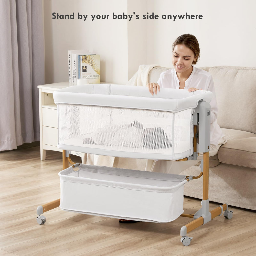 Taylengrow Baby bassinet with lockable wheels for smooth room-to-room mobility.