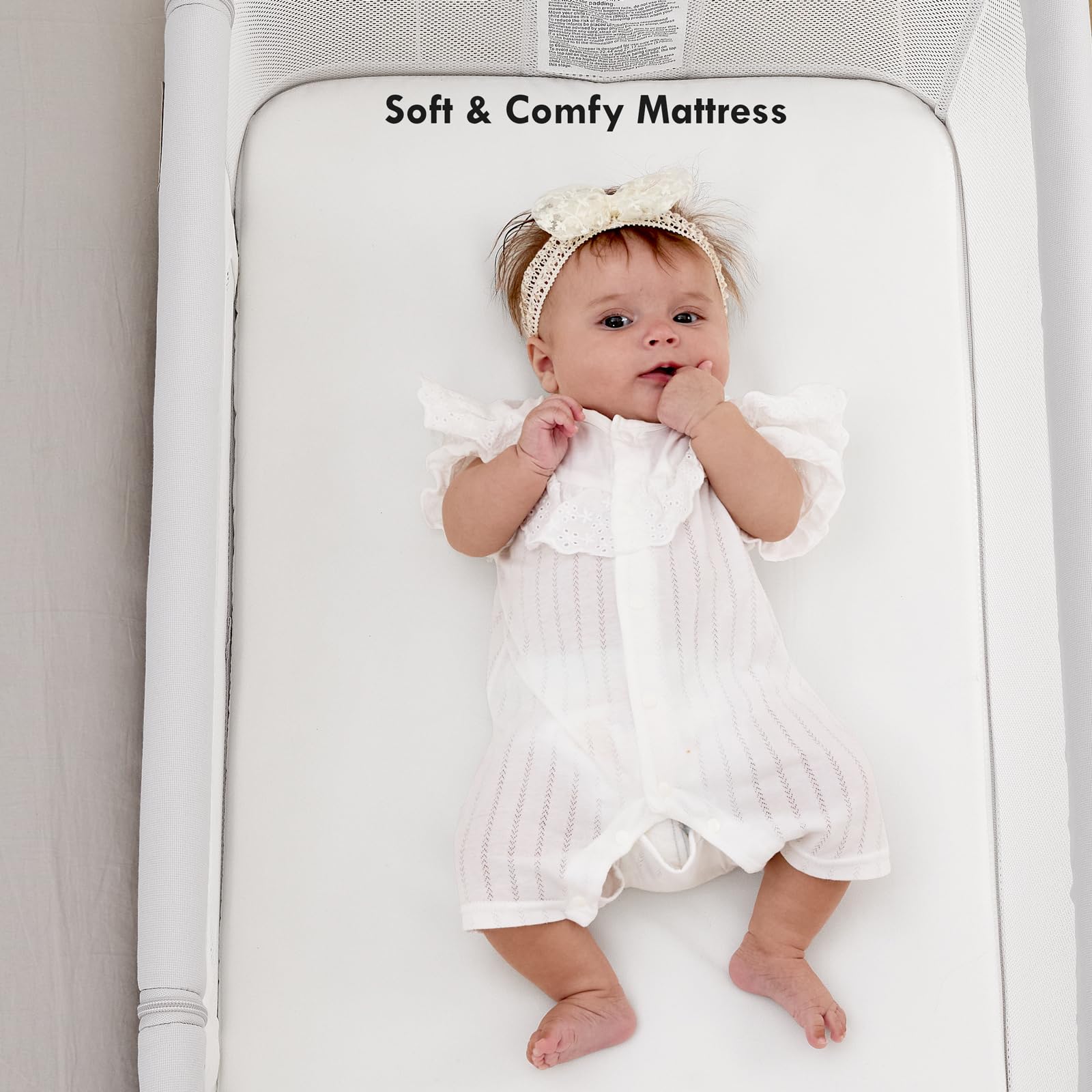 Taylengrow Baby bassinet storage basket keeps feeding essentials handy.