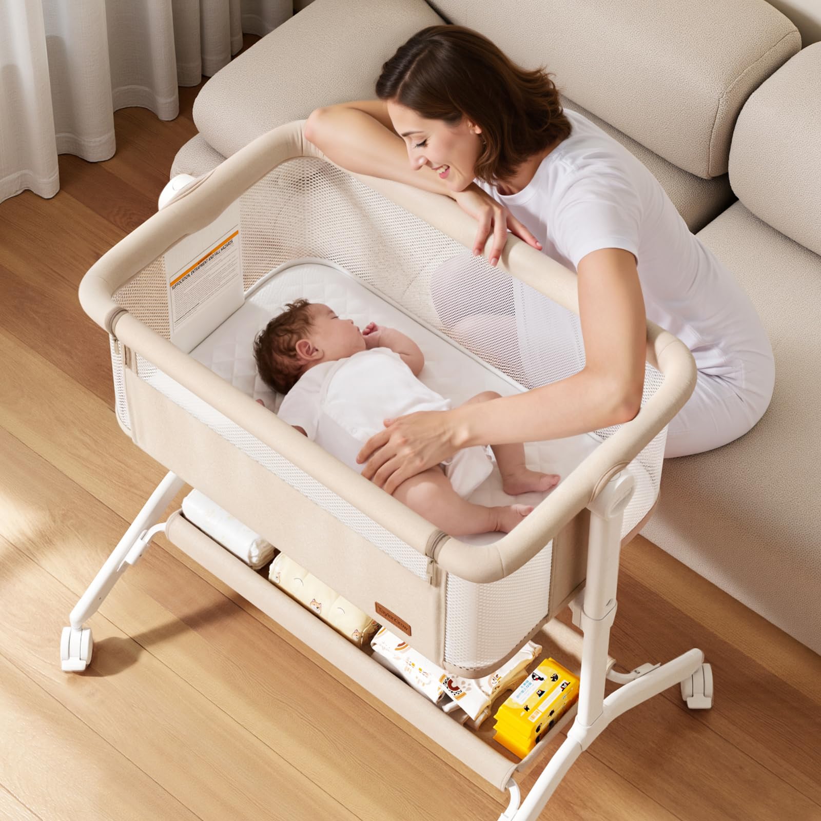 Taylengrow Baby bed-side sleeper washable mattress keeps baby clean and cozy between uses.