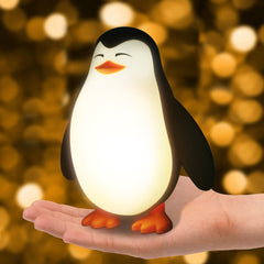 TCamp Penguin Night Light front view shows gentle glow for kid-friendly bedtime.