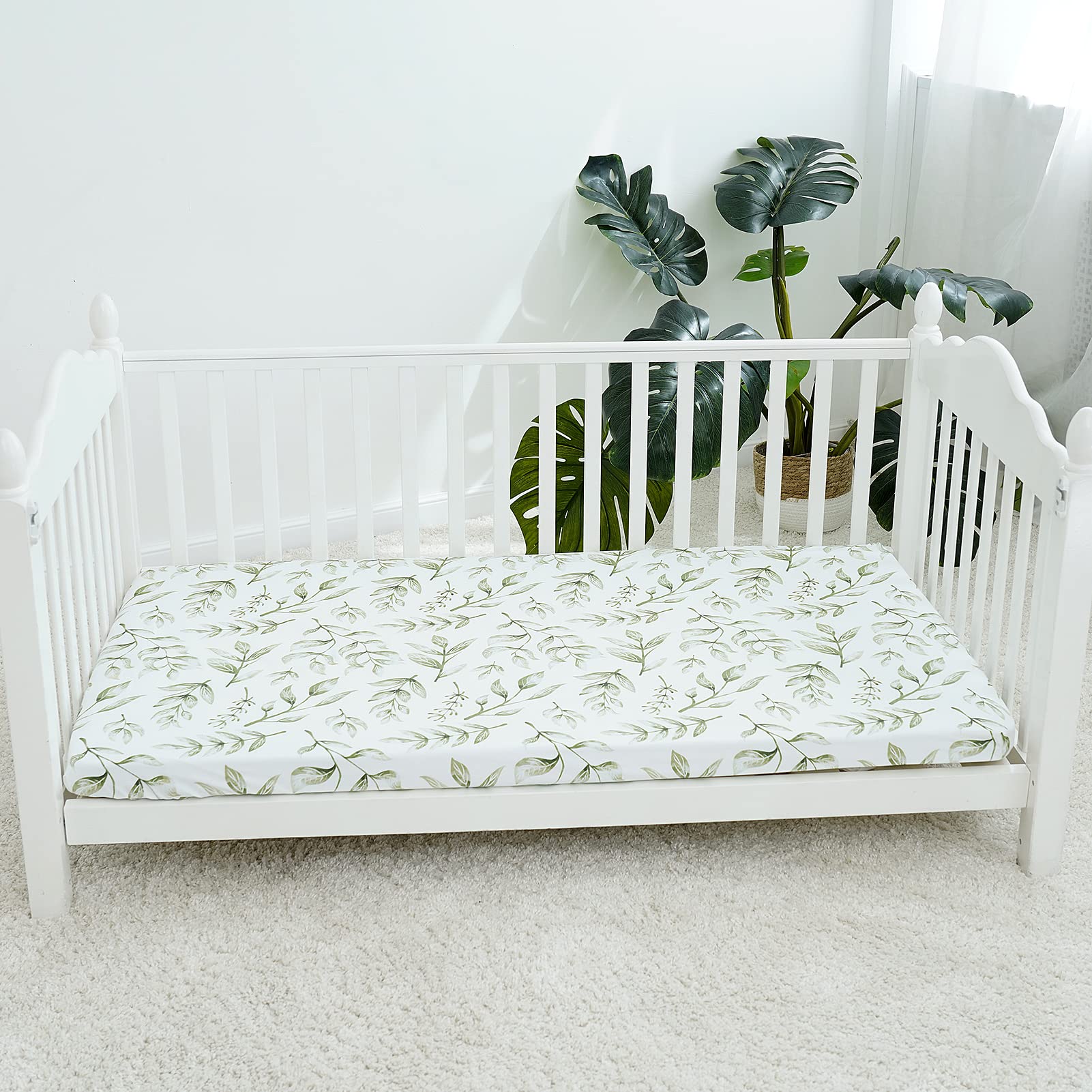 TCBunny baby-crib mattress-fit visual confirms standard 28x52 sizing.