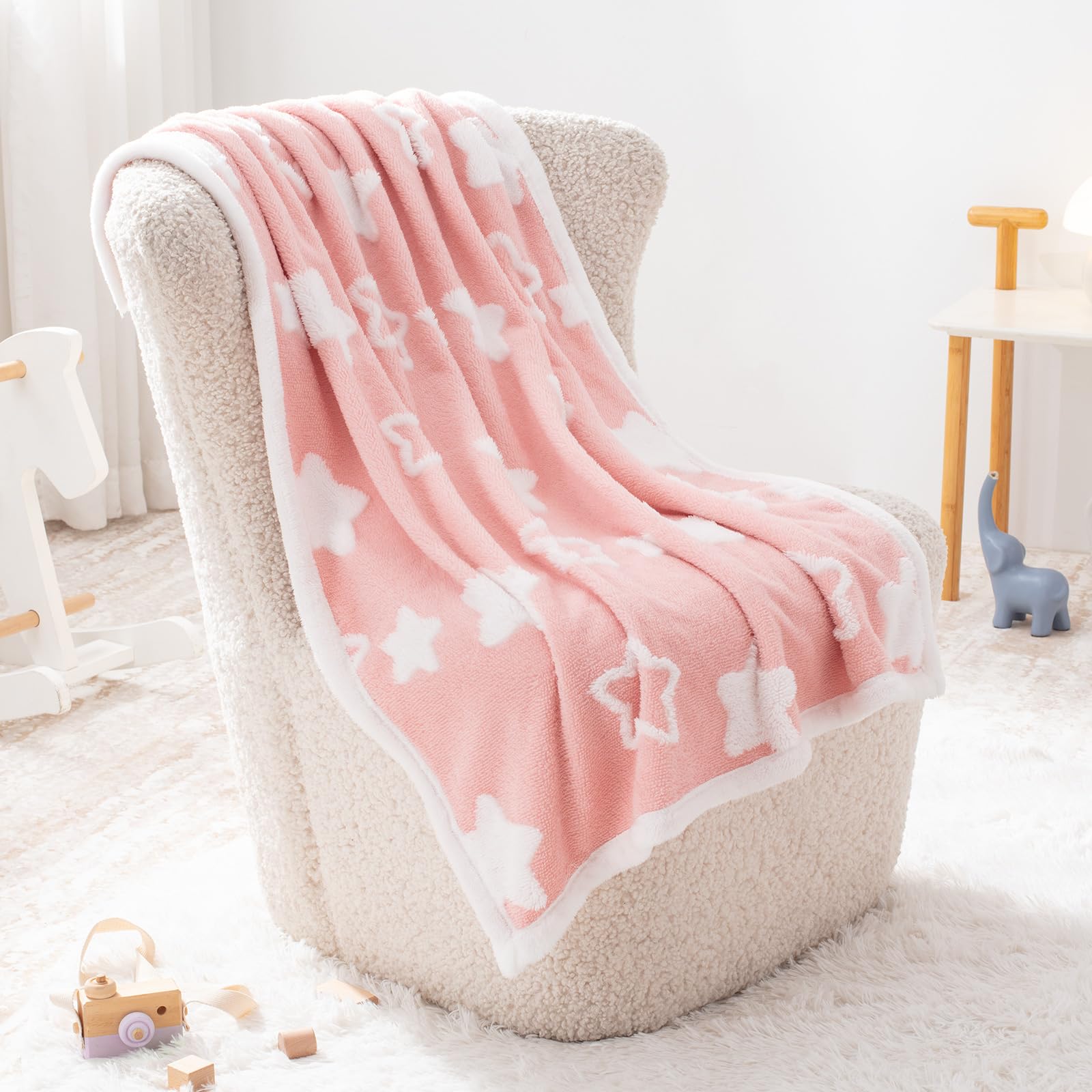 TCOYIWL baby blanket used as swaddle or nursing cover shows versatility.
