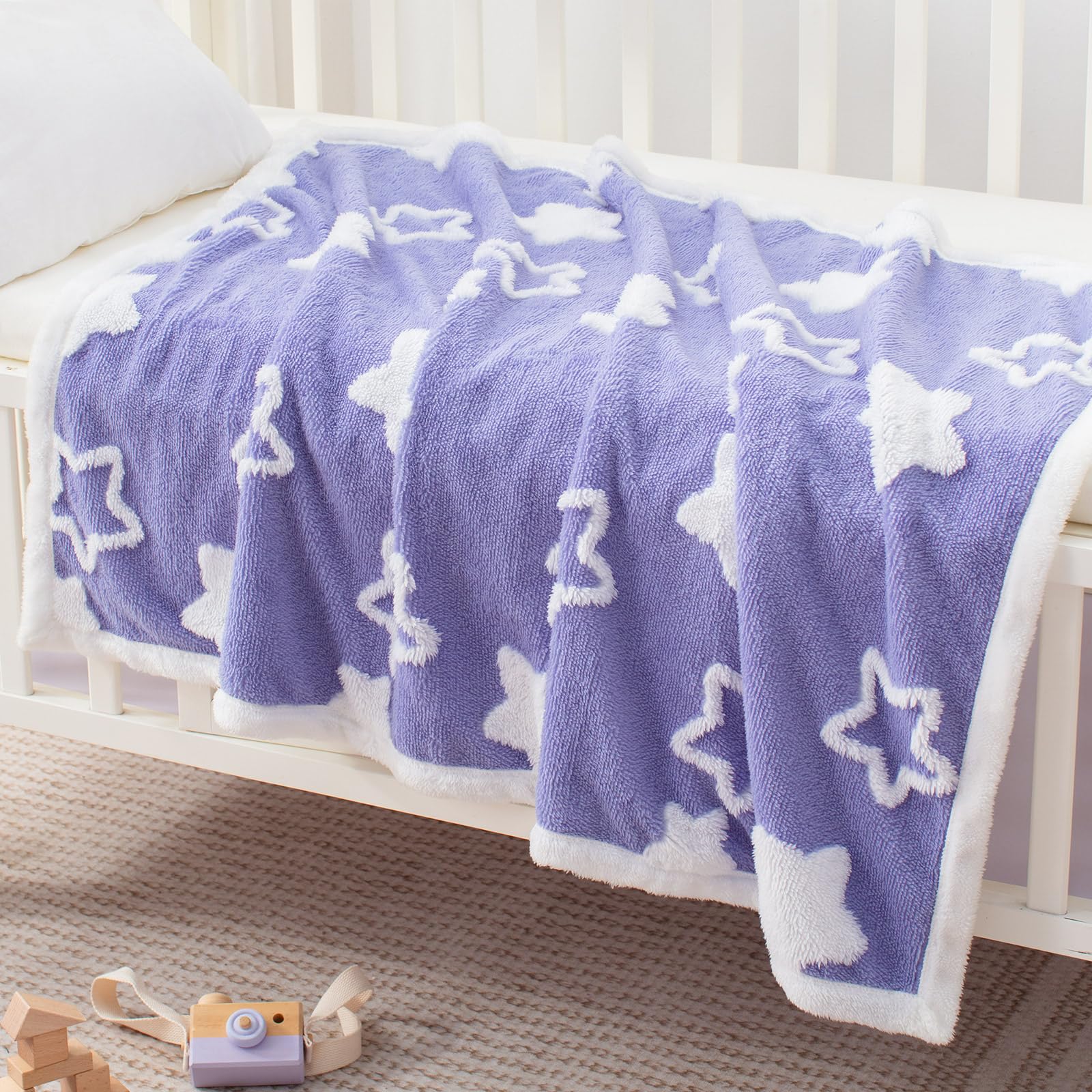 TCOYIWL multi-use blanket used as nursing cover or stroller wrap.