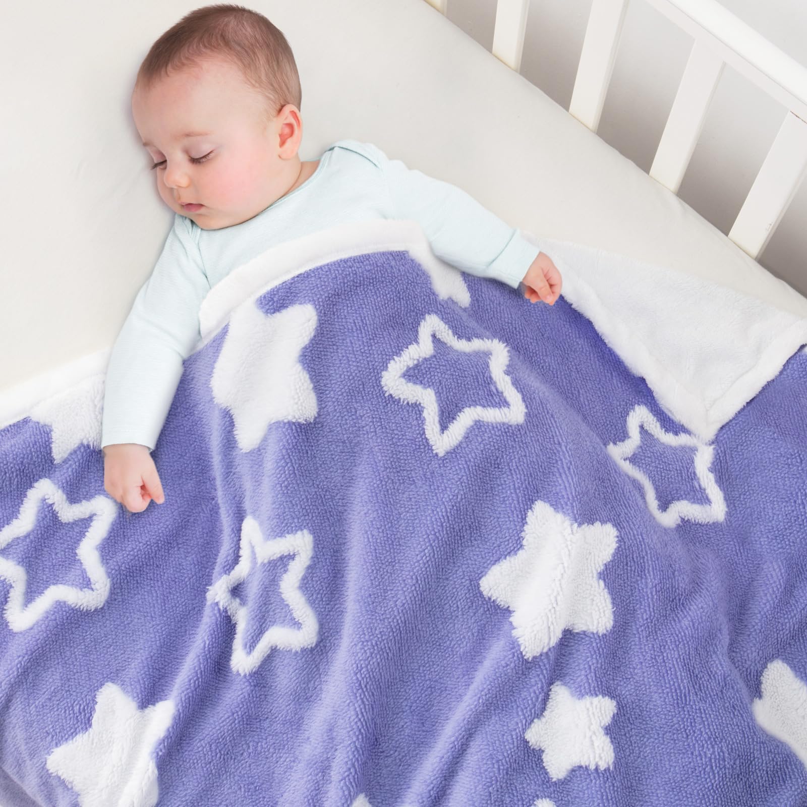 TCOYIWL baby blanket star jacquard closeup showcases plush texture and warmth.