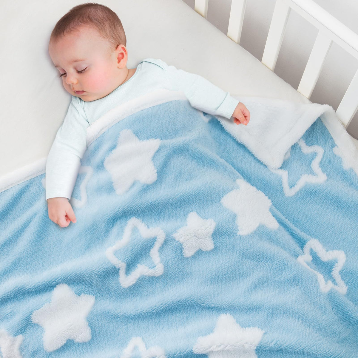 TCOYIWL baby blanket for toddlers with reversible star jacquard pattern for cozy sleep.
