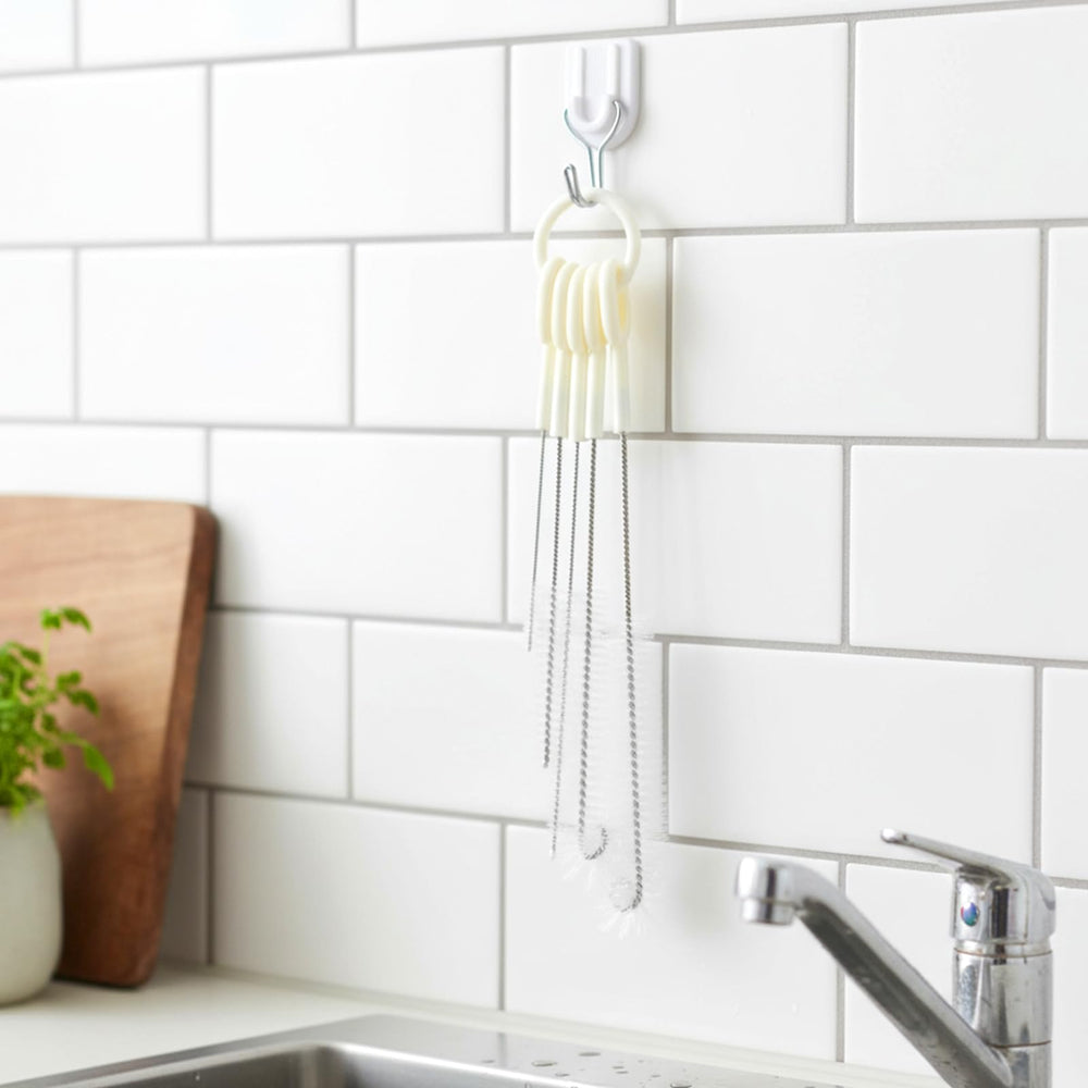 Teaaha crevice brush designed to reach seams and hard-to-clean crevices.