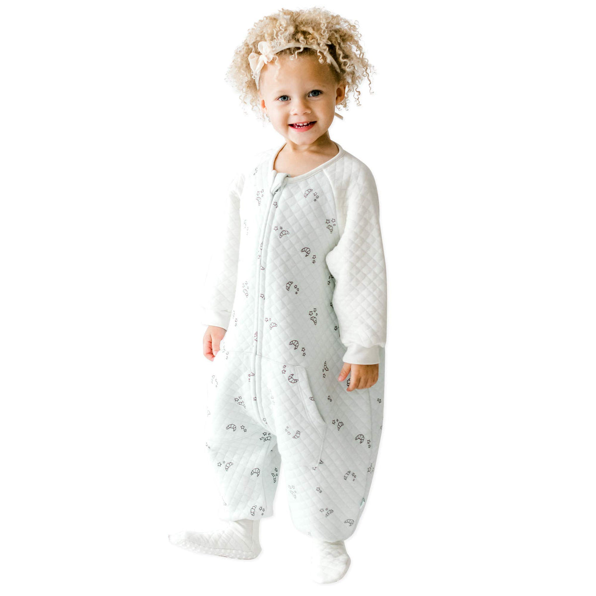 Tealbee Dreamsie croissant print front view for cozy toddler sleep comfort.