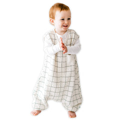 Tealbee Dreamsuit with feet-open design shows secure mobility for active toddlers.