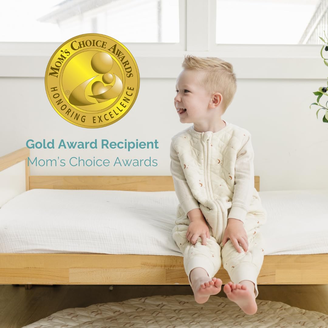 Tealbee Dreamsuit moons and stars design adds gentle bedtime appeal.