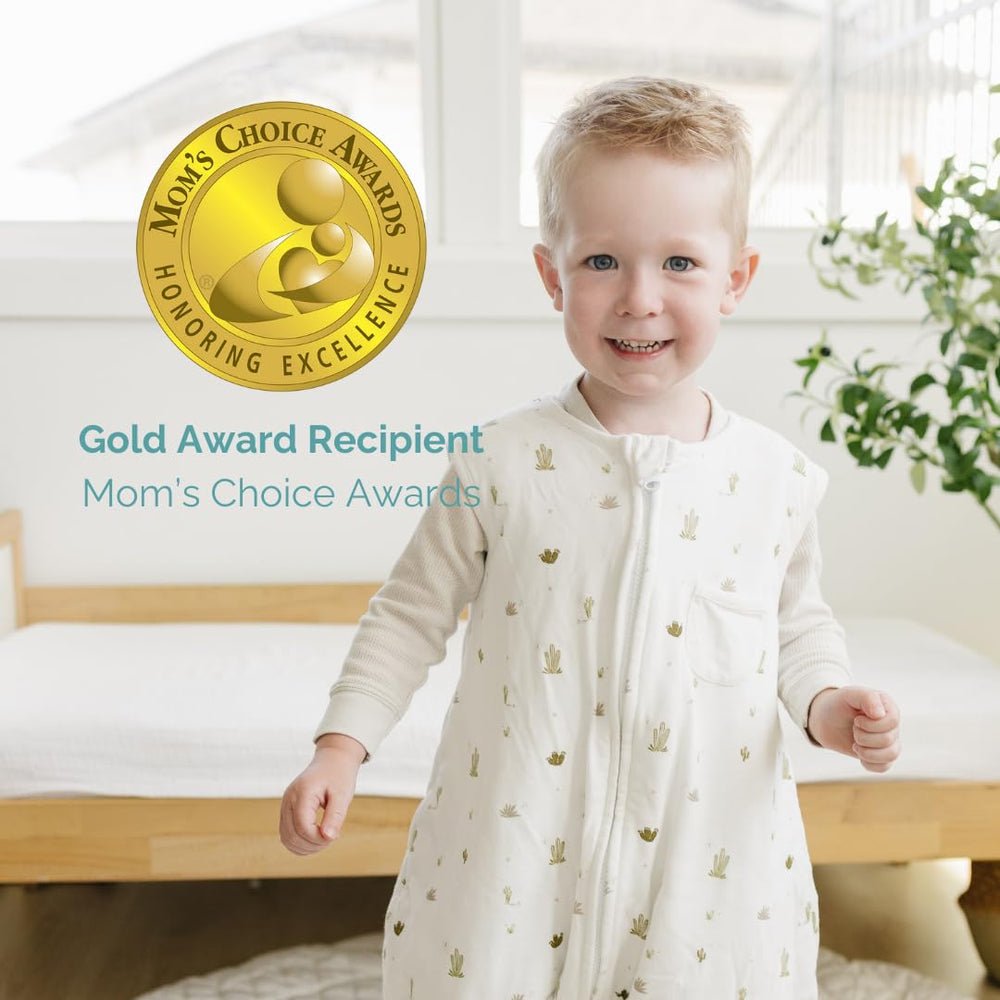 Tealbee Dreamsuit open feet design shows freedom of movement and reduced crib tangling.