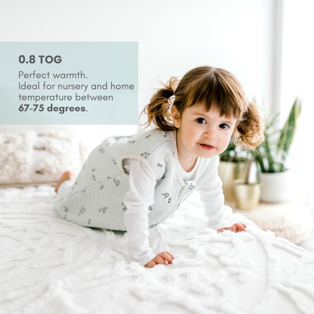 Tealbee Dreamsuit in crib scene shows roomy hip area and snug fit.
