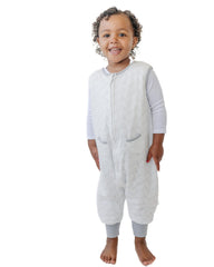 Tealbee Dreamsuit sleep sack with feet in crib showing warmth and safety