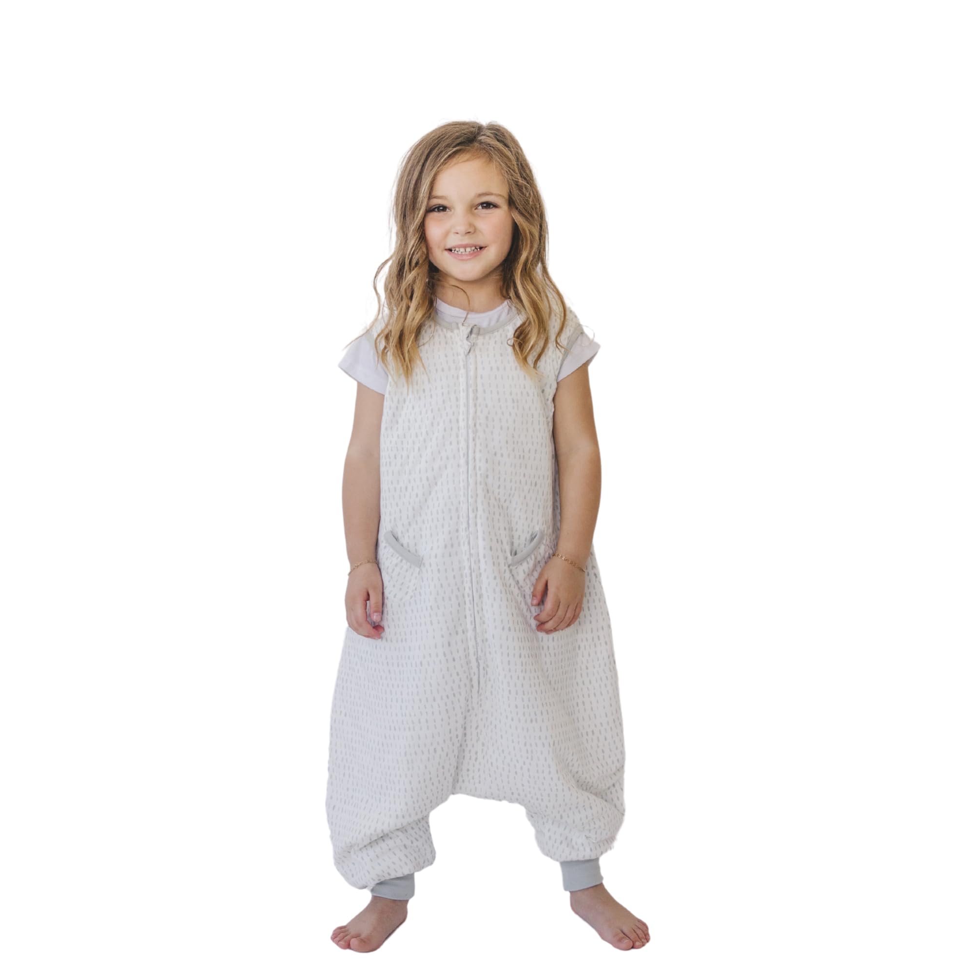 Tealbee Dreamsuit toddler sleep sack with feet promotes safe, comfortable movement in crib.