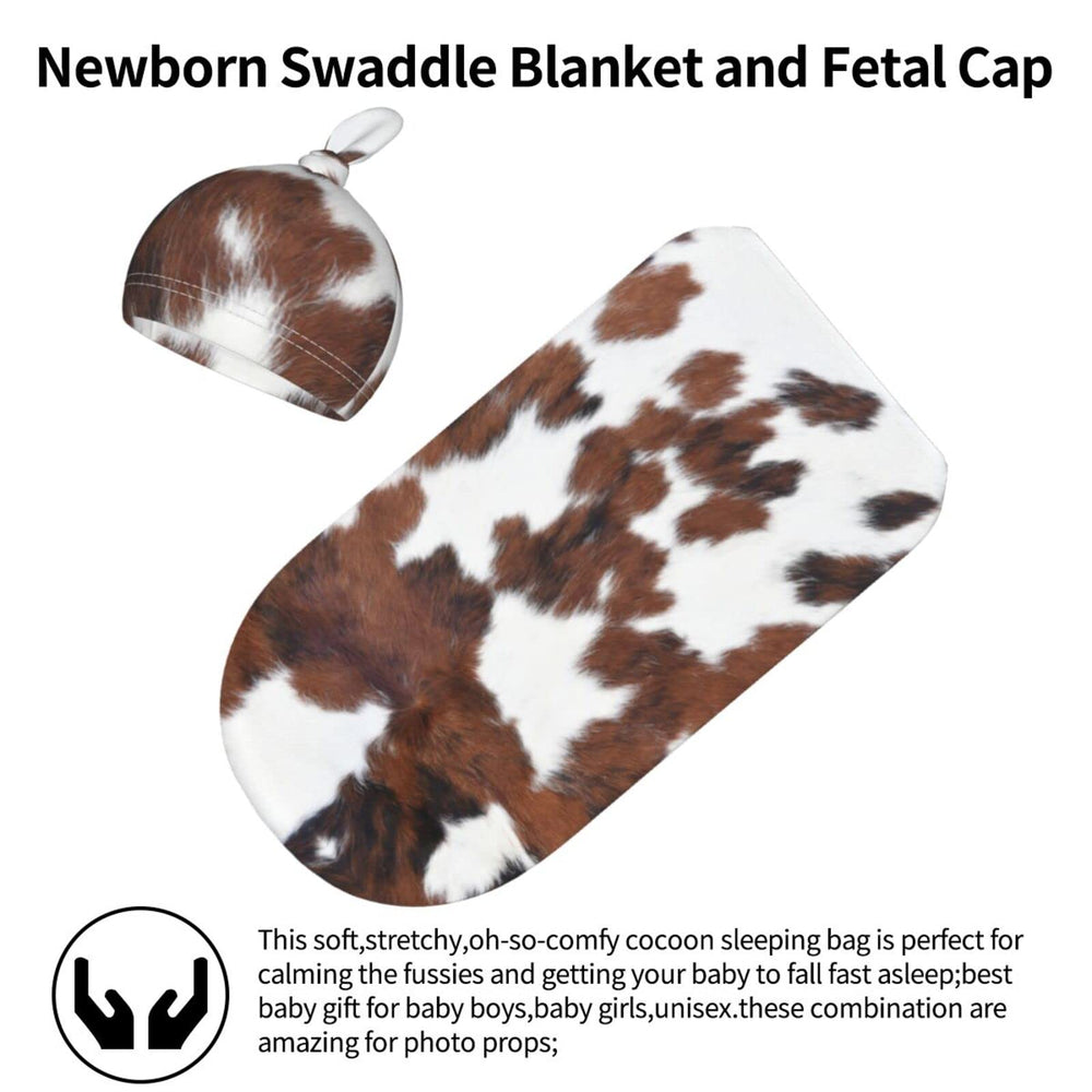 Tebjh cow print swaddle used as newborn photo prop