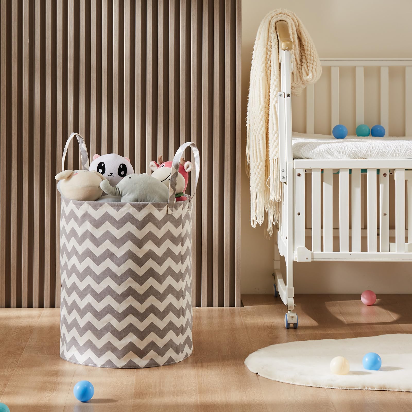 TECHMILLY grey chevron basket stores diapers and wipes with convenient handles.
