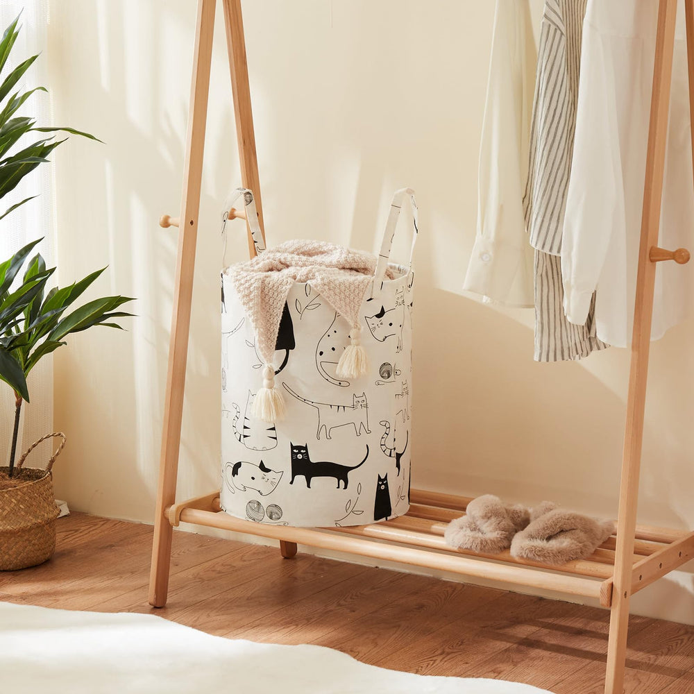TECHMILLY laundry basket with long handles for easy carrying.