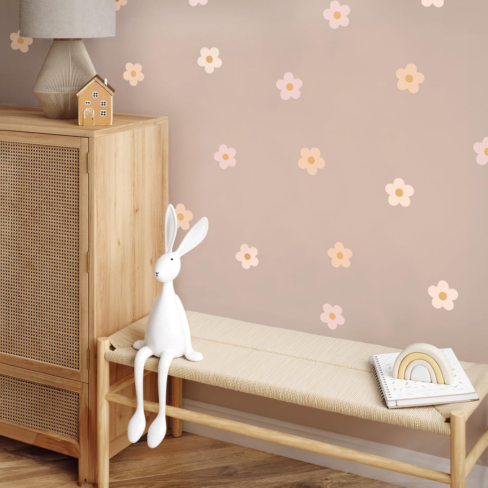 Teddylabels daisy blush pink wall sticker arrangement for playful bedrooms and cheerful playrooms.