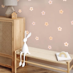 Teddylabels daisy blush pink wall sticker arrangement for playful bedrooms and cheerful playrooms.