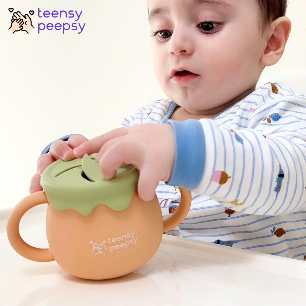 Teensy Peepsy silicone baby cup made with BPA-free materials.