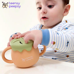 Teensy Peepsy silicone baby cup made with BPA-free materials.