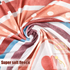 Tegeme Boho Rainbow Blanket doubles as a swaddle or nursing cover during shoots.