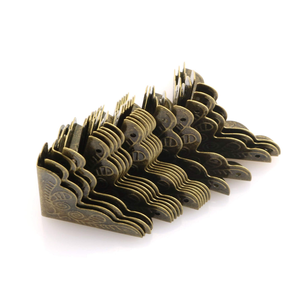 Tegg Box Corner Protector in antique brass triangle detail protects desks and boxes.