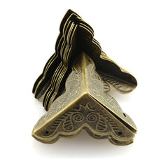 Tegg box edge guard in iron antique brass safeguards wood surfaces.