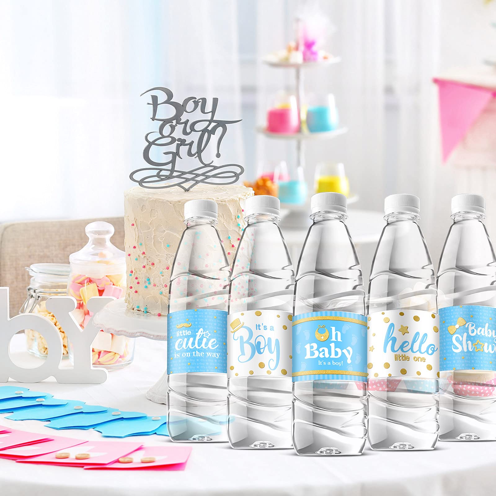 Teling baby shower decor ideas with stylish labels for drinks.