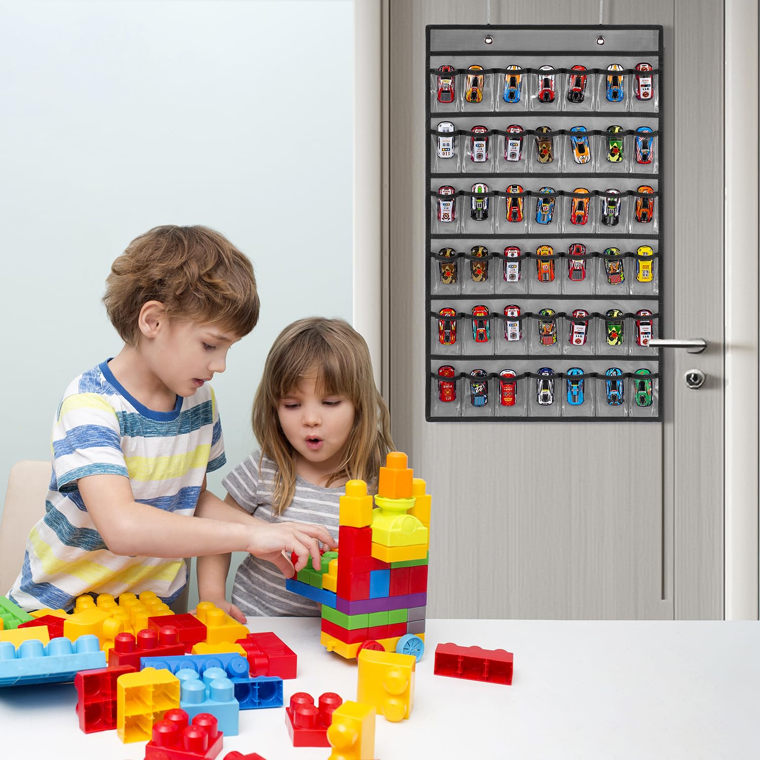 TEMUORG toy car storage organizer, hanging install with metal hooks over a door