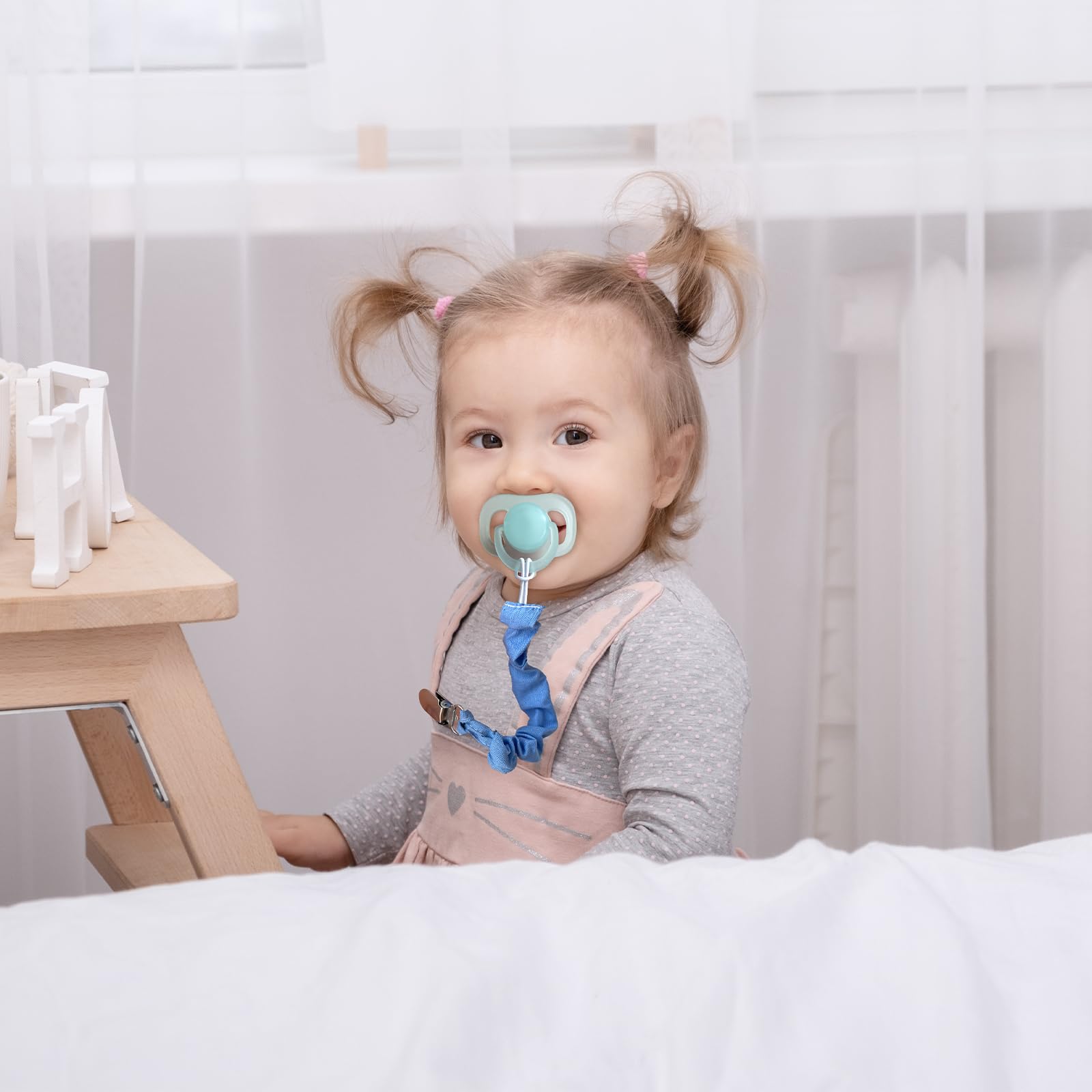 TenderBabe universal-fit clip works with most pacifiers and teethers