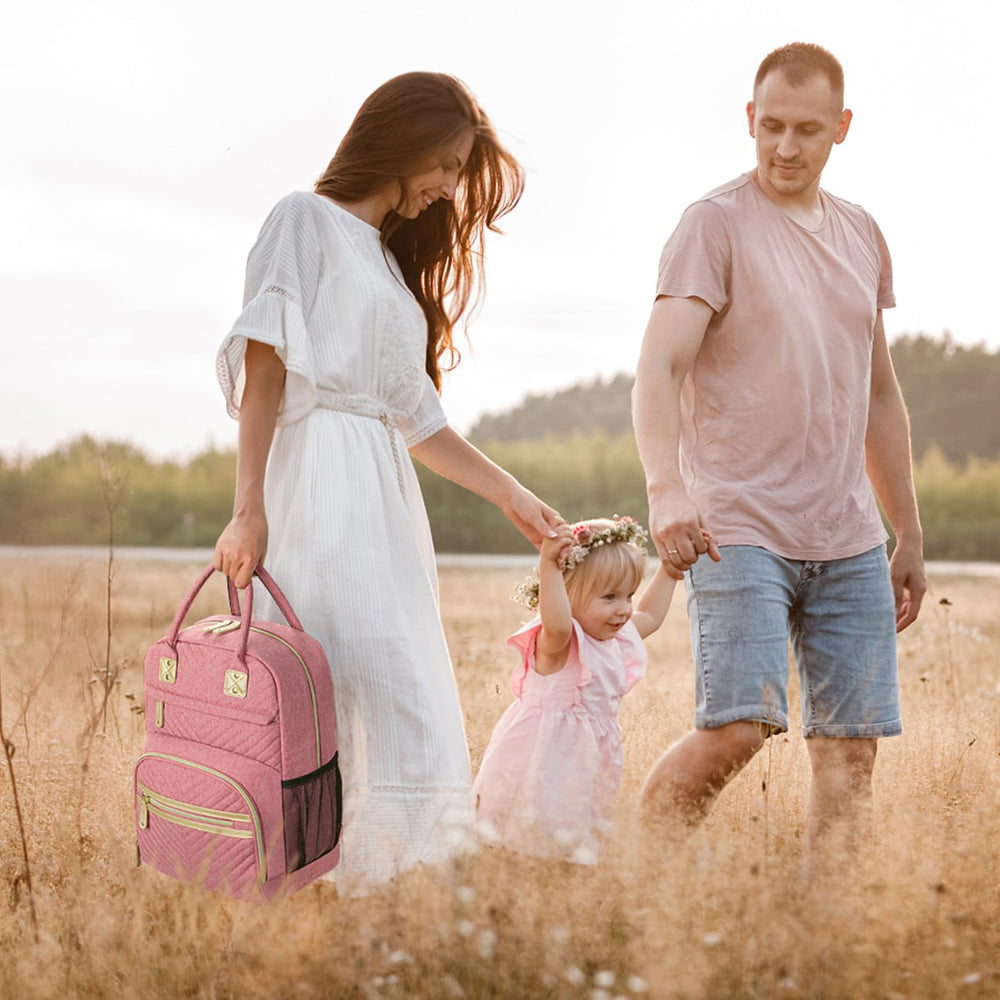 Tenot diaper bag pink includes detachable stroller straps for easy carrying.