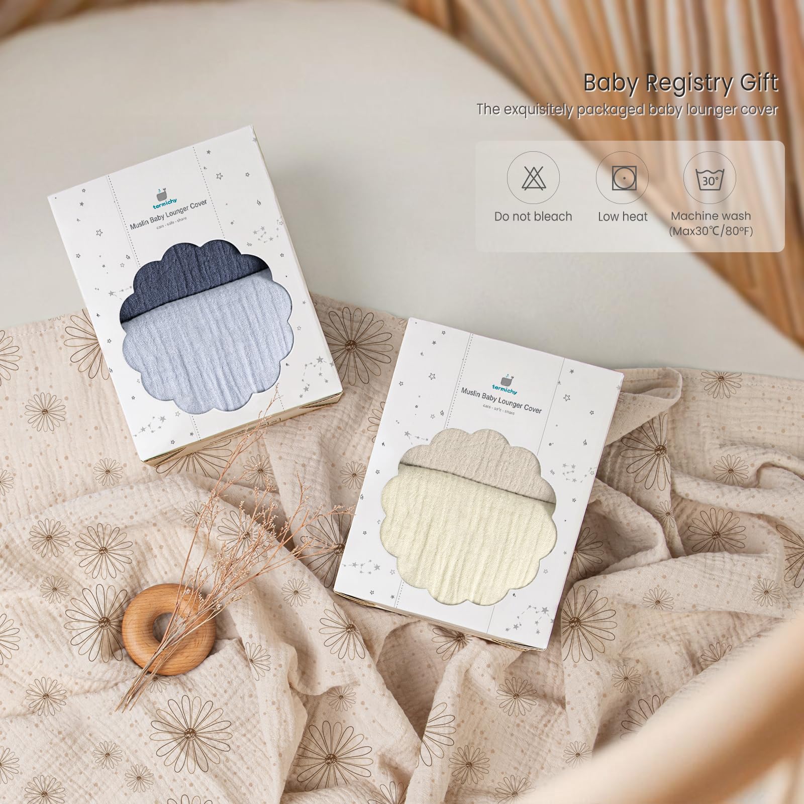 Termichy muslin cover complements nursery style with navy prints