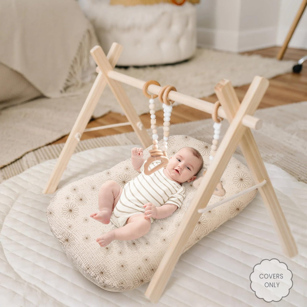 Termichy baby lounger covers muslin machine-washable fabric for easy cleanups.