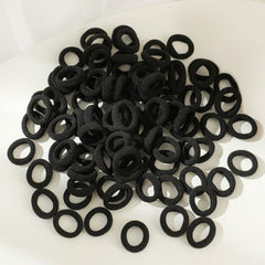 Tesvyns 0.85-inch hair bands, sturdy and stretchy for secure ponytails.