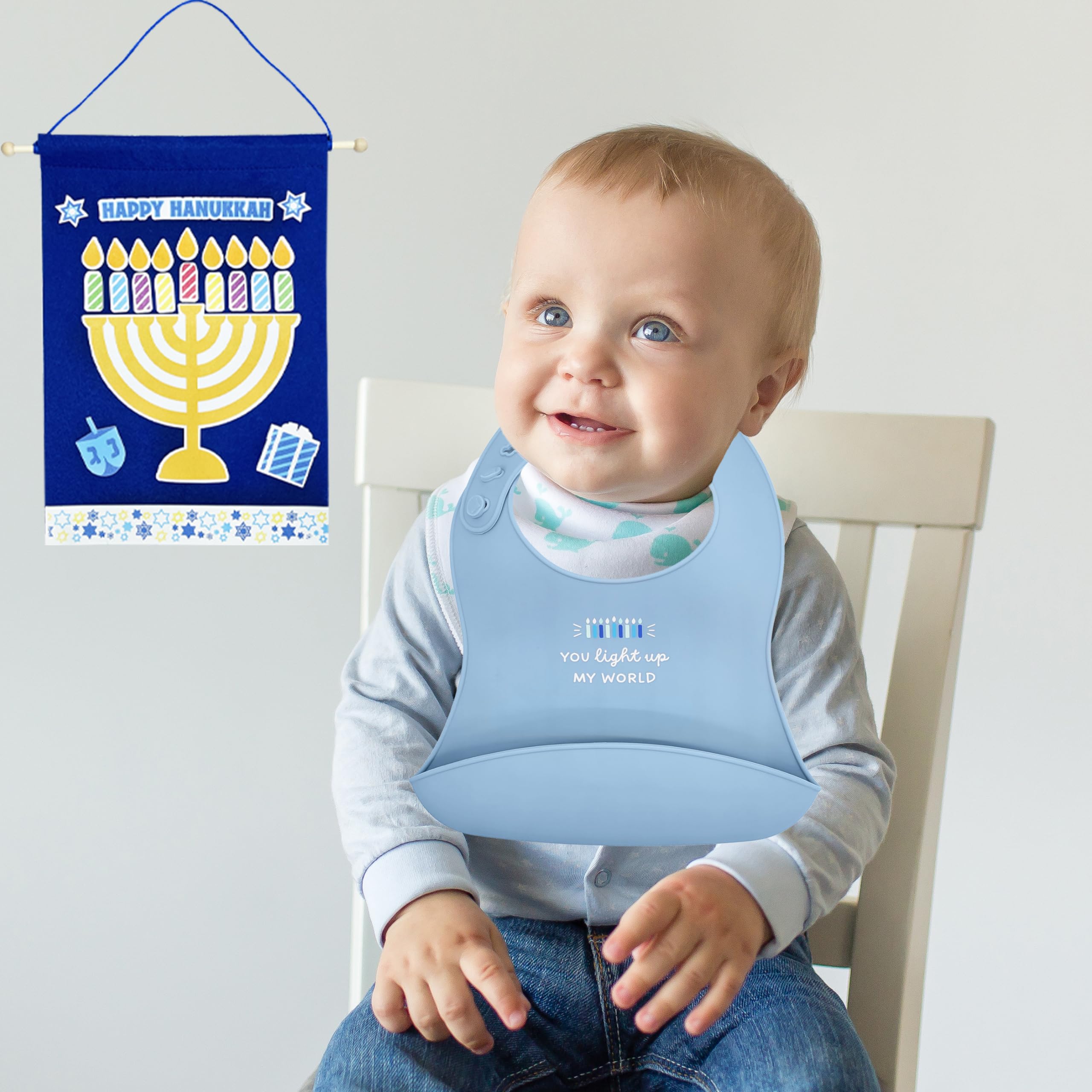 The Dreidel Company bib supports busy family dinners during Hanukkah.