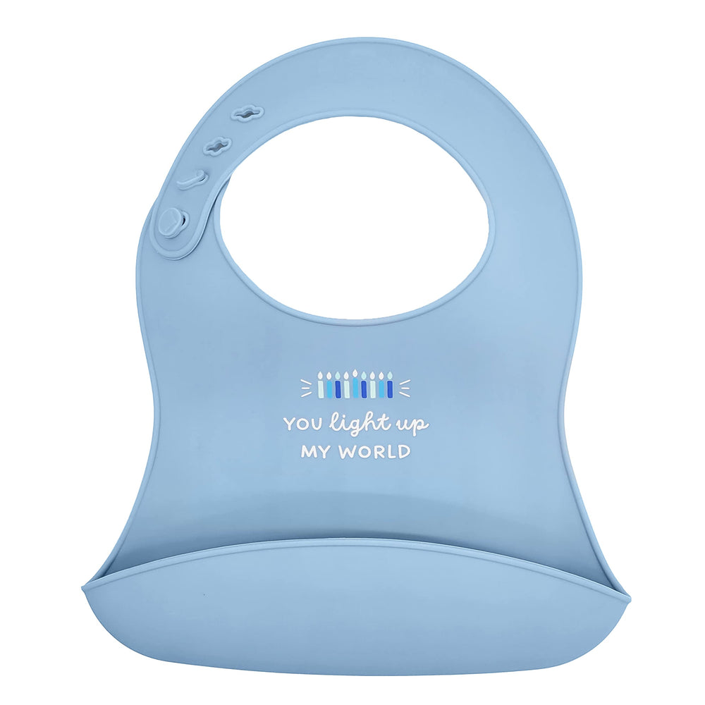 The Dreidel Company Hanukkah bib You Light Up My World design brightens meals.