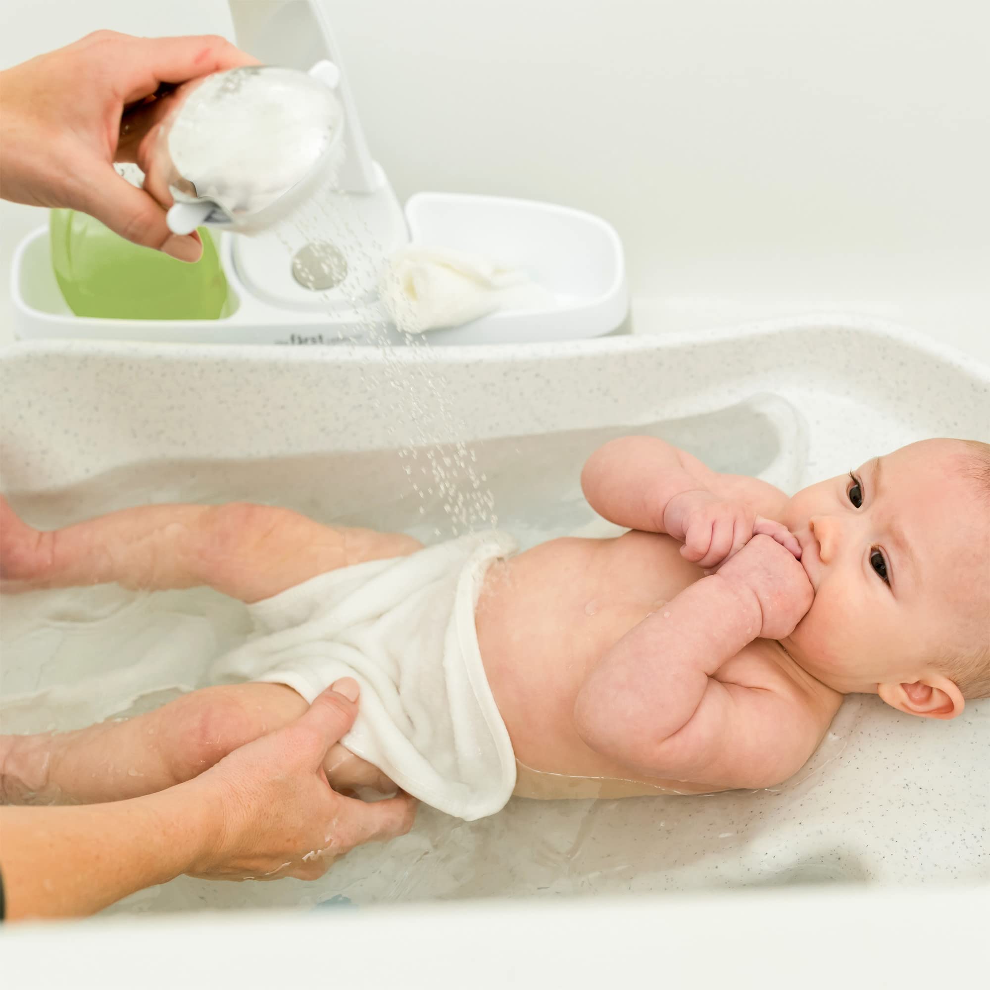 The First Years Rain Shower Head one-hand water control simplifies bath time adjustments.