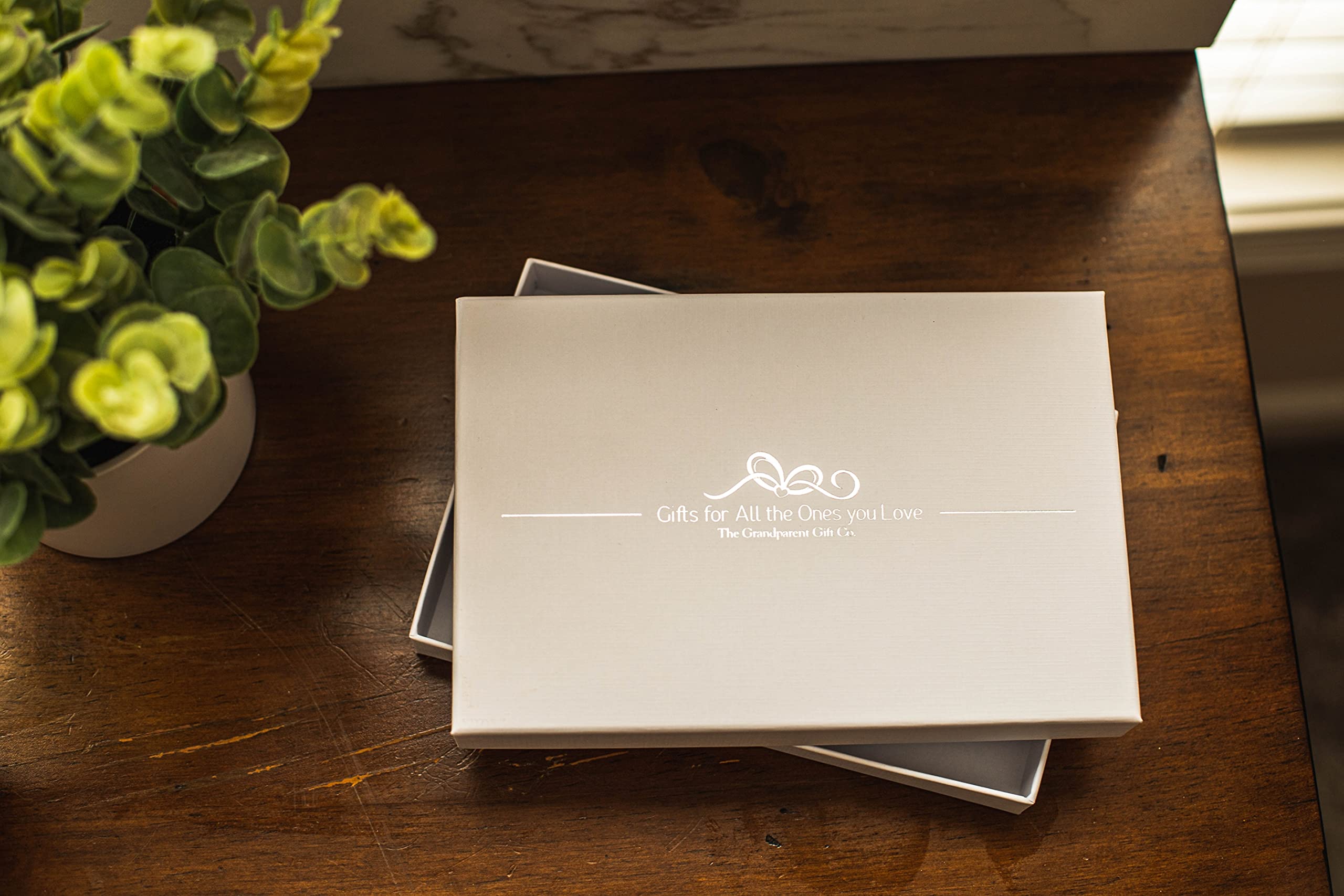 The Grandparent Gift Co. baby bump photos highlight; perfect place to save maternity memories.