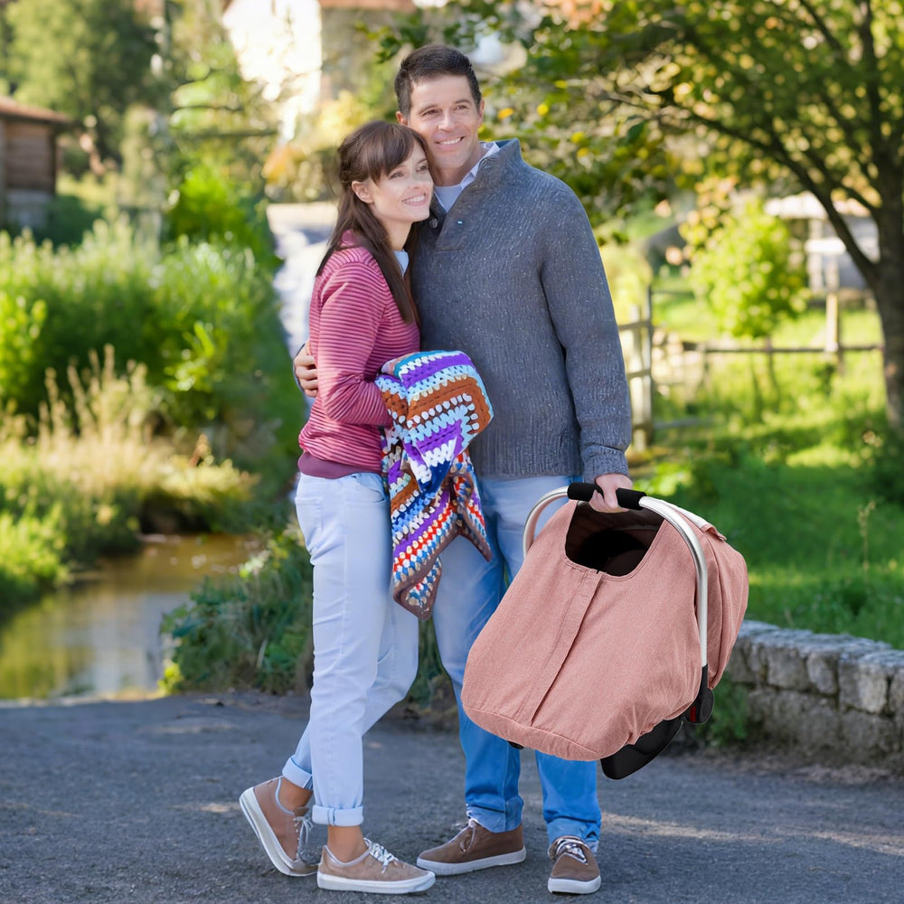 The Kenkyo winter car-seat cover creates a cozy outing space.