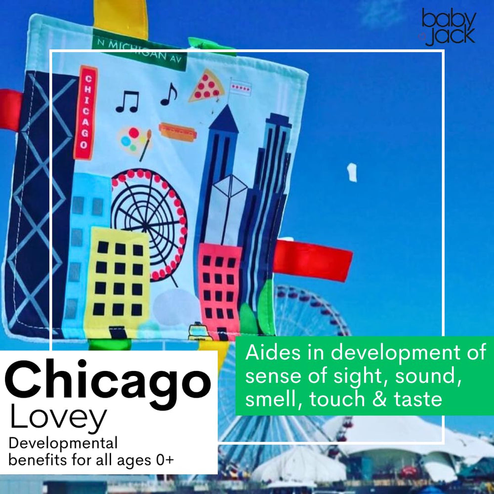 The Learning Lovey stroller-clip shows easy attachment for on-the-go play with the Chicago-themed toy.