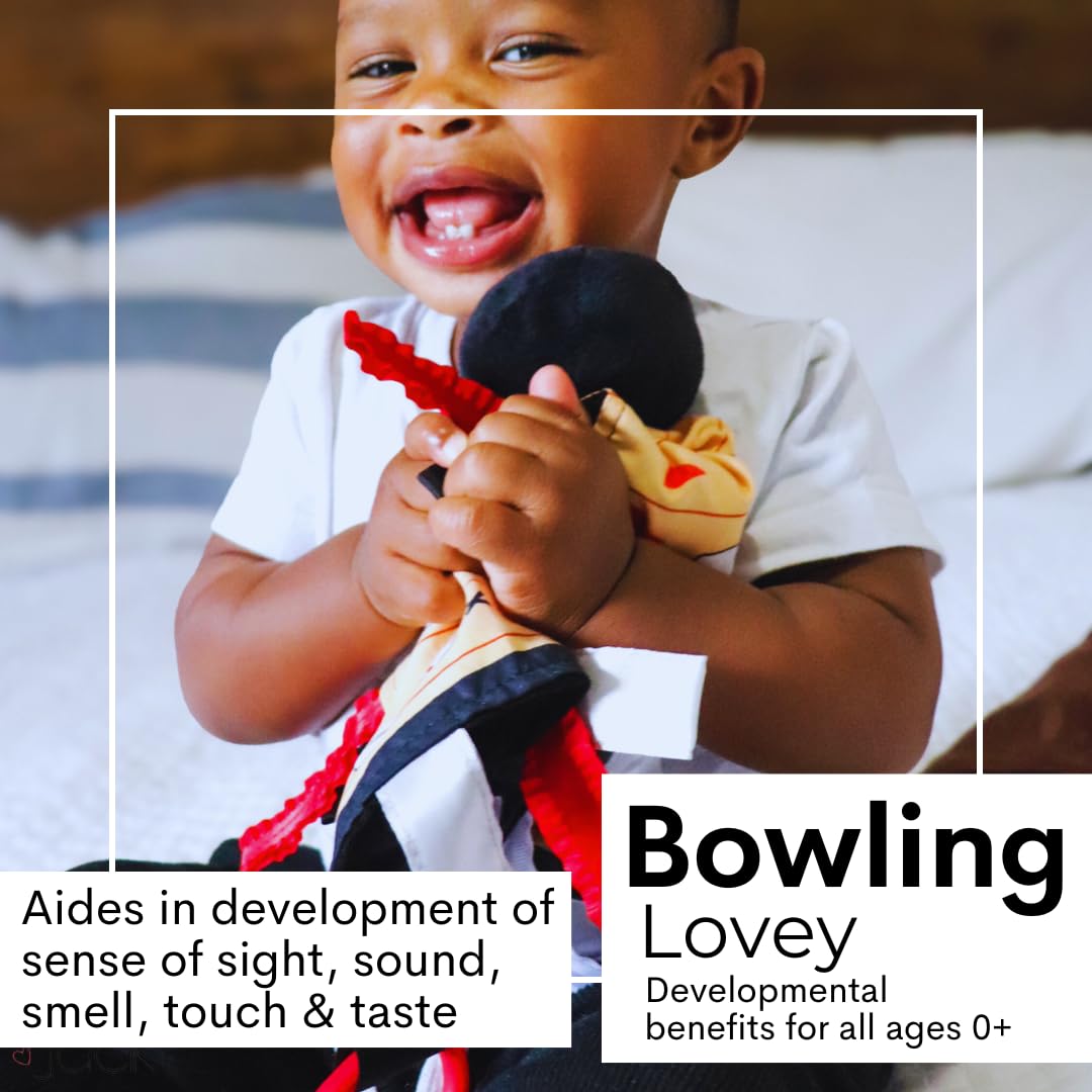 The Learning Lovey stroller clip attachment keeps the toy within reach during travel
