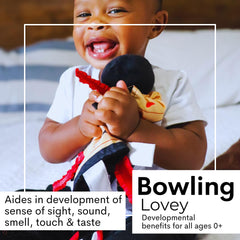 The Learning Lovey stroller clip attachment keeps the toy within reach during travel
