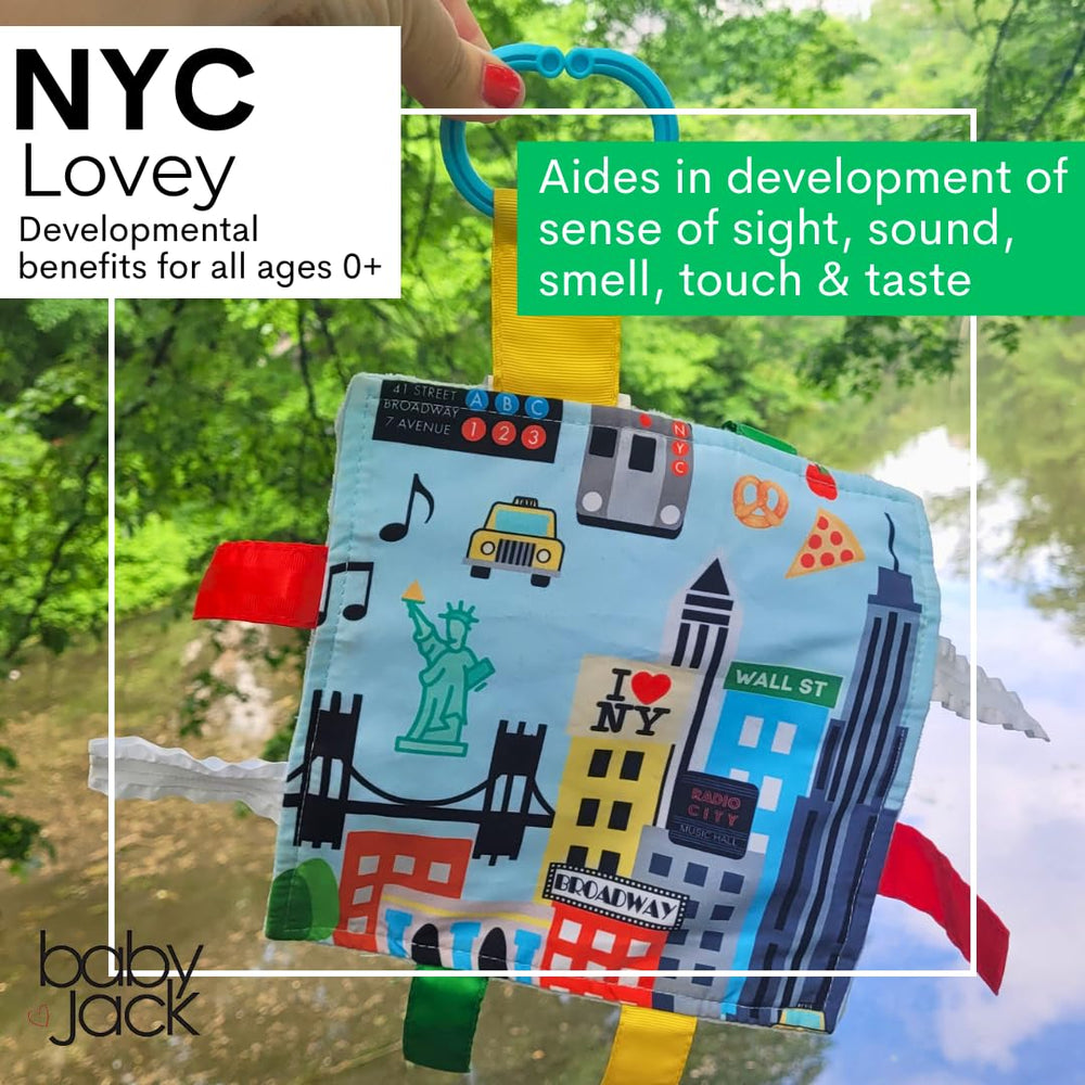 The Learning Lovey crinkle texture closeup demonstrates tactile play and audible engagement.