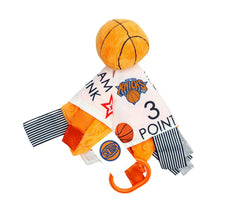 The Learning Lovey Knicks baby tag toy closeup showing crinkle texture for tactile stimulation