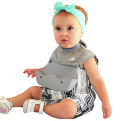 The Little Monkey Company Freddie Bib silicone catcher in action for quick cleanup after meals.