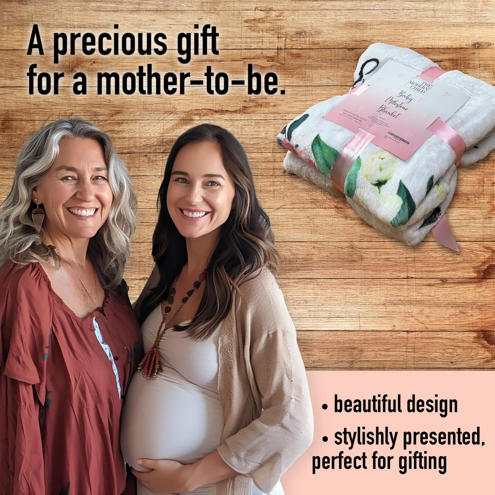 The Modern Child milestone blanket as swaddle for soothing cuddle sessions.