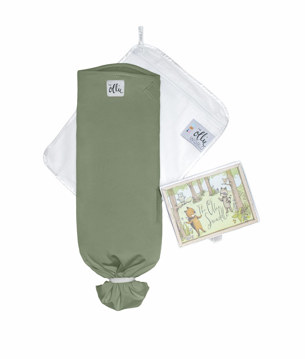 The Ollie Swaddle arms-out option supports a gradual transition and comfortable sleep