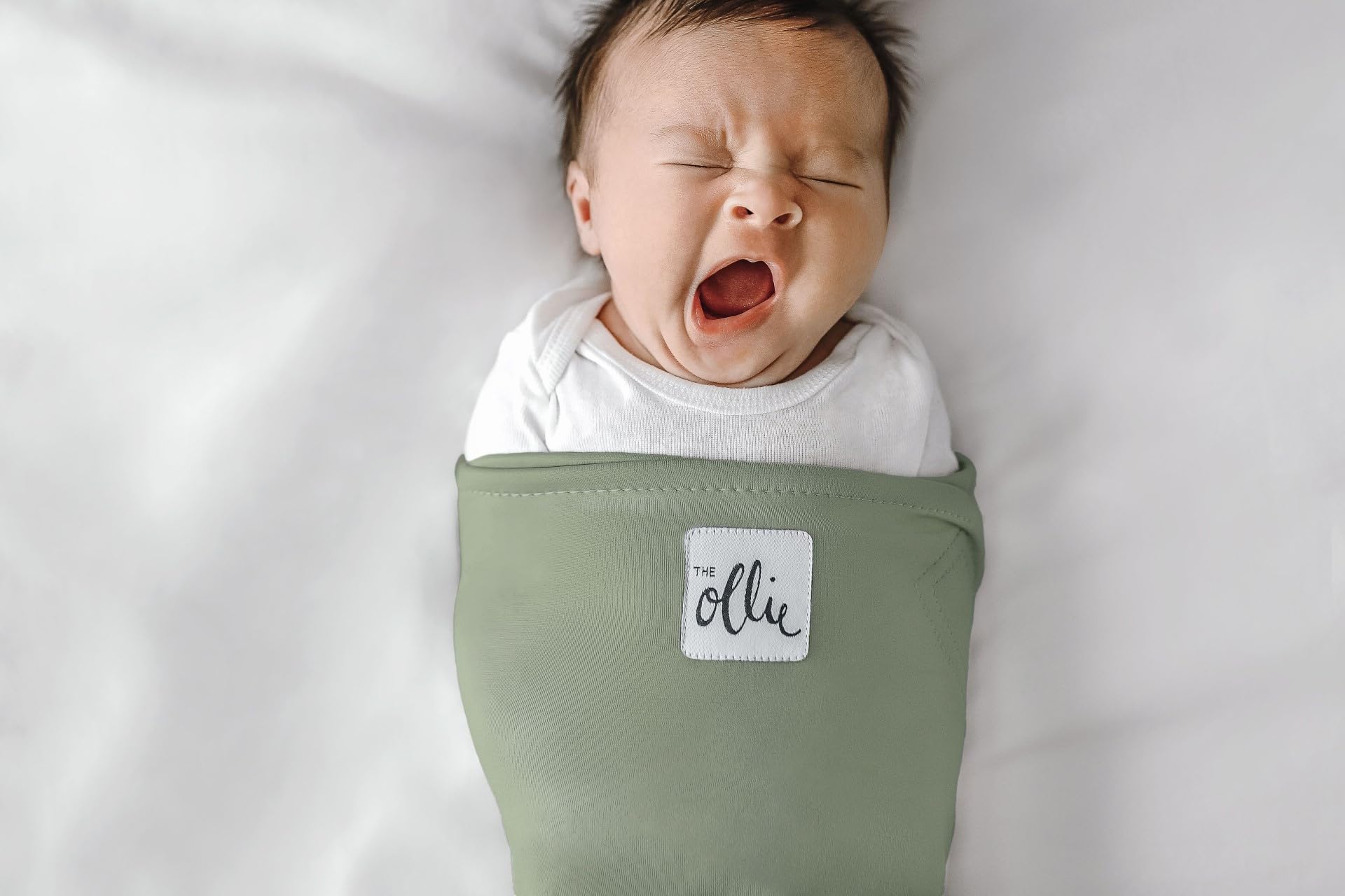 The Ollie Swaddle breathable fabric helps regulate baby temperature during sleep